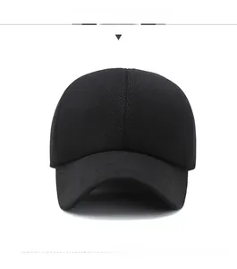Detail showing the embossed SPORT logo on the side of a black corduroy baseball cap