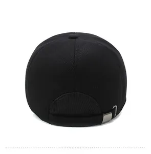 Rear view of black corduroy baseball cap showing silver metal buckle and textured fabric