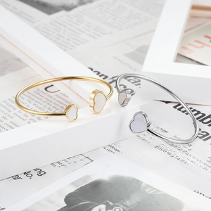 Minimalist stainless steel open heart bangles in gold and silver with shell inlay
