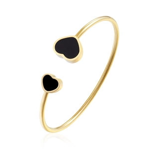Golden stainless steel open bangle featuring dual black heart-shaped shell inlay designs