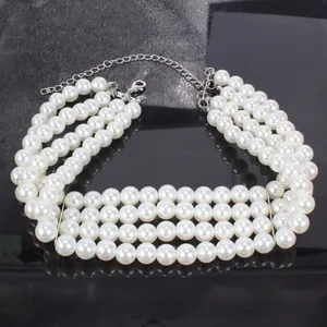Detail of four-layer faux pearl choker with silver adjustable chain and lobster clasp