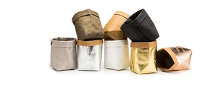 Detailed view of stackable washable kraft paper storage bags in various metallic colors