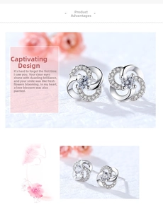 Macro shot of silver stud earrings with a central diamond and shimmering layered petals