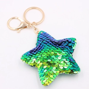 Christmas star keychain with blue-green gradient sequins and a golden metal clasp accessory