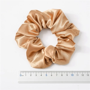 Champagne gold satin silk scrunchie for women, hair accessory measuring 11.5cm diameter
