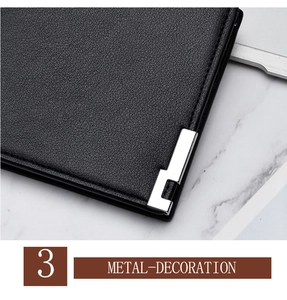 Vue macro d'un portefeuille en cuir noir avec coin décoratif en métal argenté élégant
