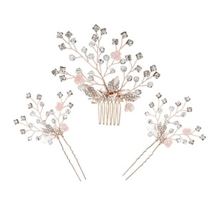 Detailed set of golden bridal hair comb and clips with pink flowers and crystals