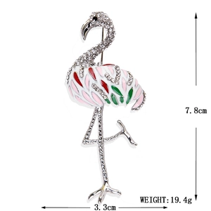Detailed view of flamingo brooch with dimensions 7.8cm height and 3.3cm width