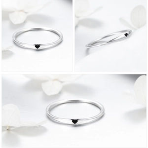 Three-way view of S925 sterling silver ring with a minimalist black enamel heart design