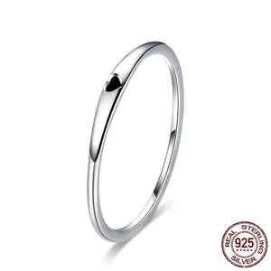 Polished S925 sterling silver minimalist ring with a delicate heart cut-out design