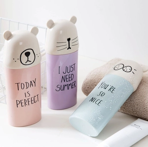 Portable animal shaped travel toothbrush cups in pink, purple and light blue colors