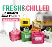 Detail of multiple candy-colored waterproof insulated lunch bags showing various colors