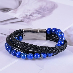 Detail of multi-layer leather bracelet with blue lapis lazuli beads and magnetic clasp