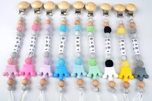 Nine colorful baby pacifier clips featuring wooden clips and silicone crown beads