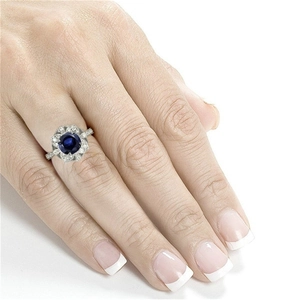 Bague fleur évidée pour femme avec zircon bleu rond et design en forme de pétale