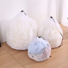 Three sizes of mesh laundry bags with black drawstrings for washing machine clothing protection