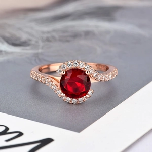 Classic rose gold plated ring with large round ruby and pave zircon accents for women