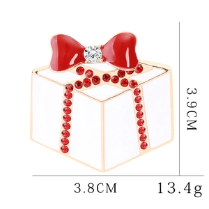 Detailed gift box brooch with red bow and crystal in 3.8cm x 3.9cm dimensions