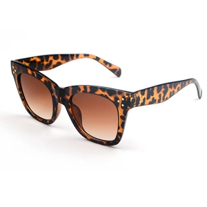 Classic tortoise shell sunglasses with brown gradient lenses and gold rivet accents