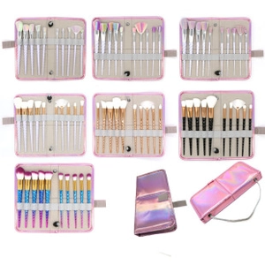 Macro view of mermaid makeup brush set in a holographic pink travel pouch