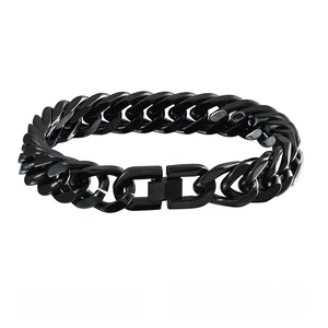 Detailed macro view of a black stainless steel Cuban link bracelet with D-shaped magnetic clasp