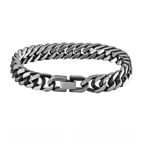 Macro shot of silver-toned cuban link biker bracelet with fold-over clasp mechanism