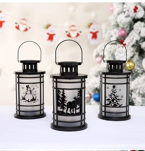 Three-piece black Christmas lanterns set featuring snowman, deer, and tree silhouettes