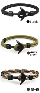 Detailed view of woven anchor bracelets in black, army green and tricolor cords