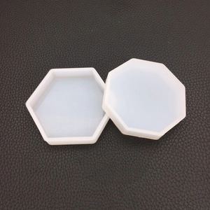Close-up of hexagonal and octagonal silicone molds for DIY resin casting and crafts