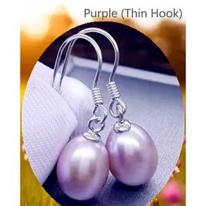 Detail of genuine lavender freshwater pearl earrings with silver fine hook hooks