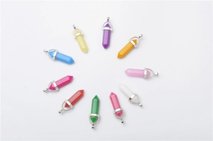 Detailed arrangement of ten multi-colored hexagonal quartz point pendants with metal caps