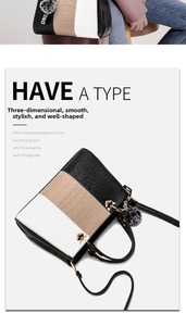 Detailed view of tricolor拼接 leather handbag with crocodile pattern and pompom charm