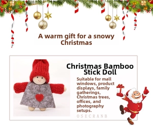 Miniature Christmas snowman plush with red knitted hat and heart detail on a bamboo stick