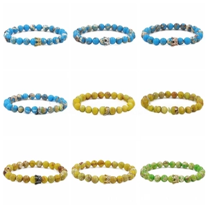 Detailed grid of 8mm crown beaded bracelets with natural tiger eye and turquoise stones