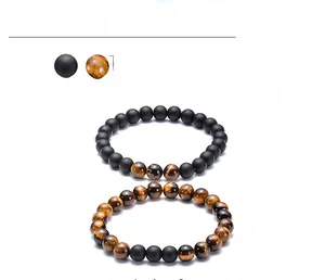 Detail view of 8mm tiger eye and matte stone bracelets showing sizing and 6.7 inch length