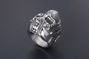 Detailed view of silver punk steel skull ring with intricate warrior helmet design