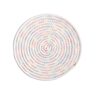 Handwoven round white cotton rope coaster with colorful zigzag stitching for table heat protection