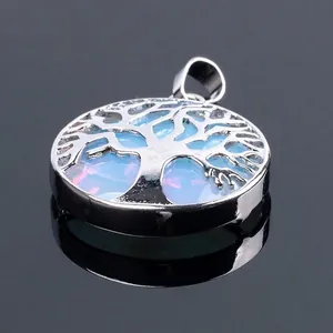 Silver tree of life pendant necklace featuring an iridescent opal stone on black mirror