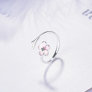 Floral silver open ring with pink enamel flower and crystal on branch-shaped band