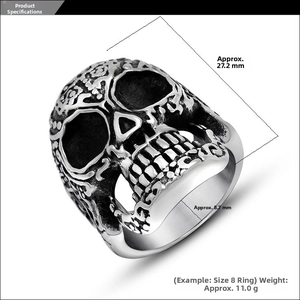 Detailed macro view showing the vintage skull ring dimensions and antique steel texture