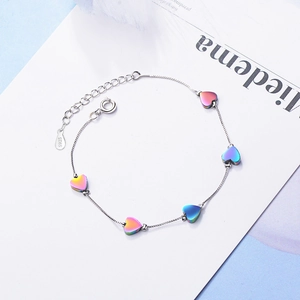 Minimalist S925 silver bracelet featuring five colorful gradient heart-shaped beads