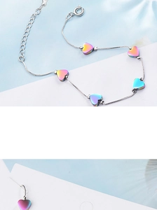 Detail of S925 silver heart bracelet with five colorful gradient beads and extension chain