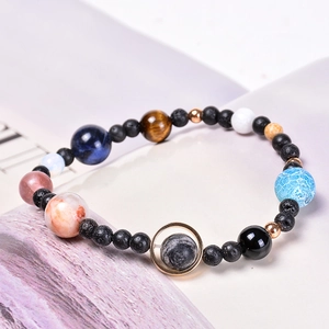Handmade solar system natural stone planet bracelet featuring tiger eye and lava rock