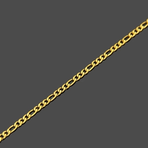 Detail of golden stainless steel Figaro chain showing polished links and metallic shine