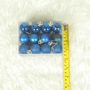 Detailed set of 12 blue Christmas ornaments in glossy, matte, and glitter finishes