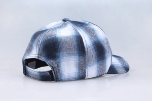 Rear view detail of cotton plaid baseball cap showing adjustable velcro strap and texture