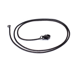 Minimalist black metal curb chain necklace with lobster clasp on white background