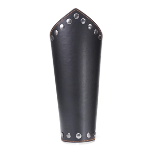 Punk black leather wrist guard with orange stitching and metal studs on white background