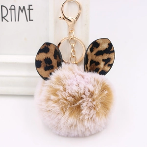 Close-up of leopard print ears fluffy keychain with golden lobster clasp and ring