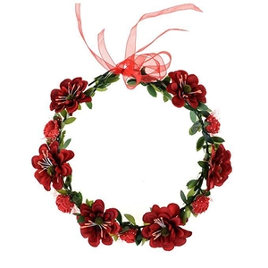 Close-up of red rose bridal wreath with berries and organza ribbon on white background
